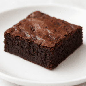 A single serving of a Rich chocolate brownie.